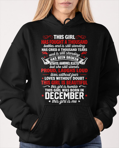 DECEMBER GIRL – HAS FOUGHT A THOUSAND BATTLES – INSPIRATIONAL GRAPHIC T-SHIRT FOR WOMEN - MTNN12 (SKU2607-299-12)